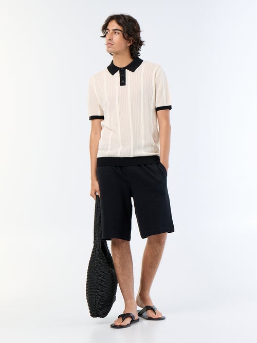 Polo en coton uni pour homme - Kiabi Polo en coton uni pour homme - Kiabi