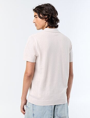 Polo homme en coton uni à manches courtes