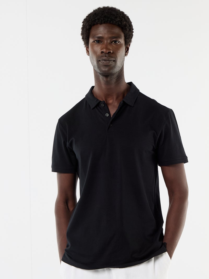 Polo en jersey avec col boutonné Noir - Kiabi