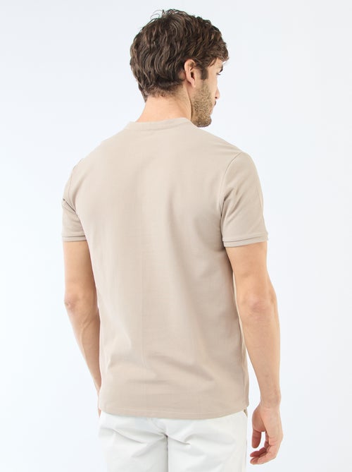 Polo en maille piquée homme à col tunisien - Kiabi Polo en maille piquée homme à col tunisien - Kiabi
