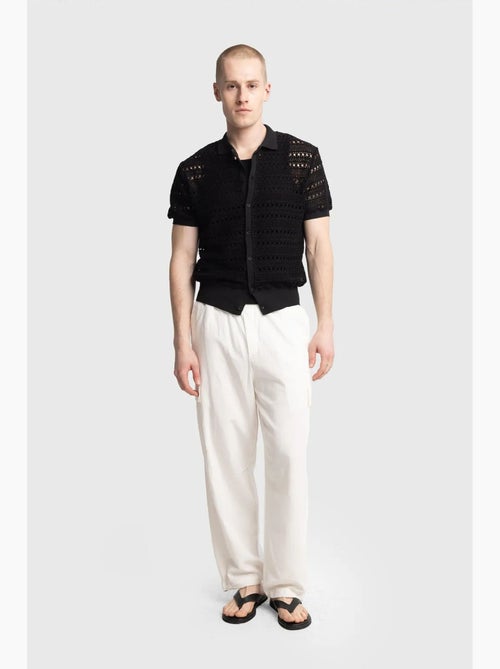 Polo en maille texturée avec fermeture boutonnée giesto - Kiabi