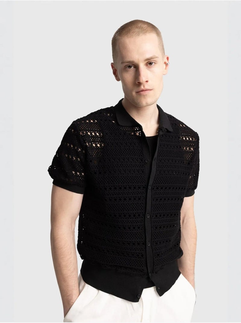 Polo en maille texturée avec fermeture boutonnée giesto Noir - Kiabi