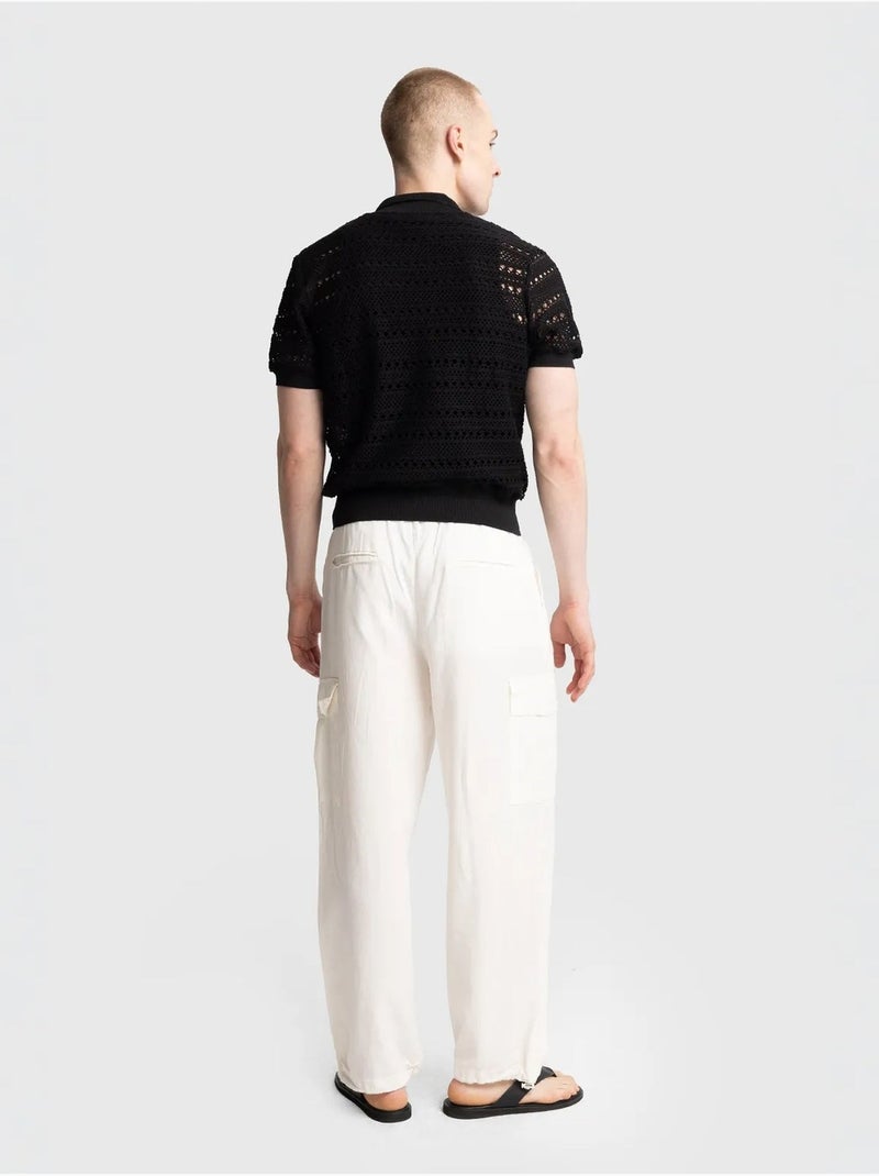 Polo en maille texturée avec fermeture boutonnée giesto Noir - Kiabi