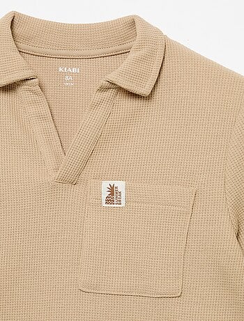 Polo en matière en nid d'abeilles