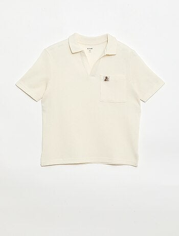 Polo en matière en nid d'abeilles