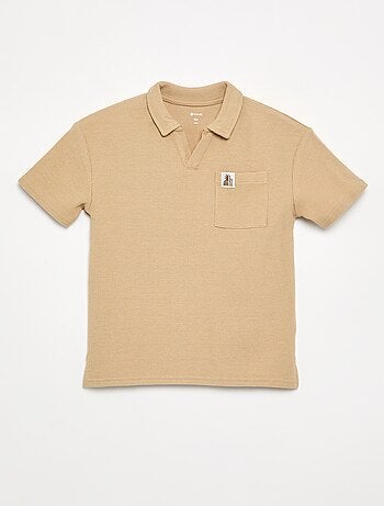 Polo en matière en nid d'abeilles