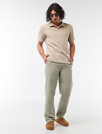 Polo en matière fantaisie ajourée