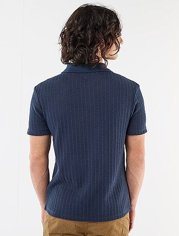 Polo en matière fantaisie ajourée