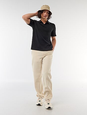 Polo en matière fantaisie ajourée