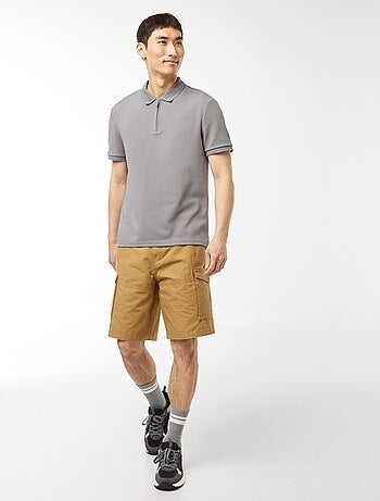 Polo en nid d'abeilles et col zippé