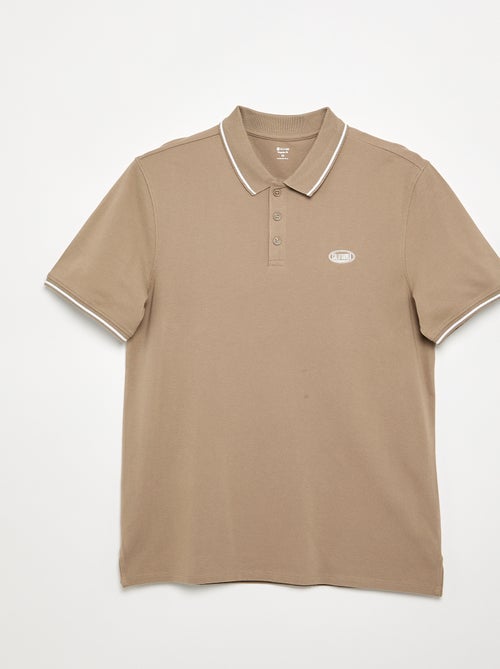 Polo en piqué de coton avec broderie à la poitrine - Kiabi Polo en piqué de coton avec broderie à la poitrine - Kiabi