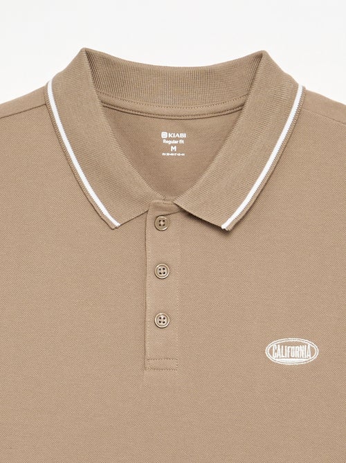 Polo en piqué de coton avec broderie à la poitrine - Kiabi Polo en piqué de coton avec broderie à la poitrine - Kiabi