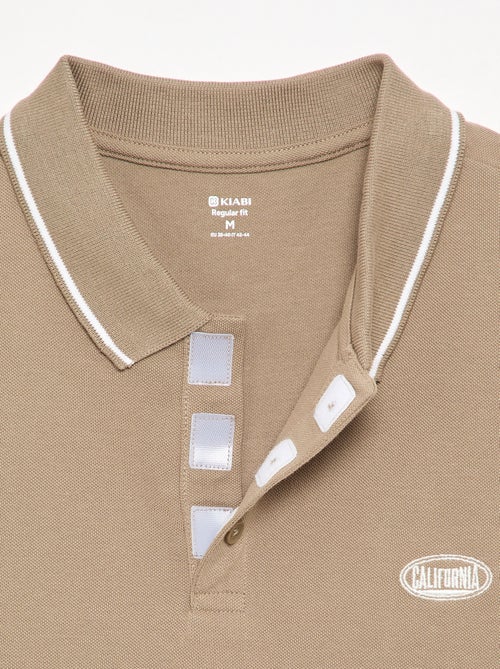 Polo en piqué de coton avec broderie à la poitrine - Kiabi Polo en piqué de coton avec broderie à la poitrine - Kiabi
