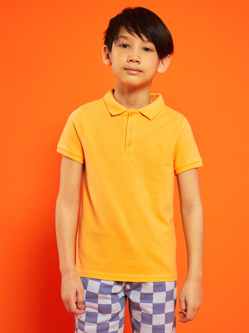 Polo en piqué de coton uni orange abricot - Kiabi