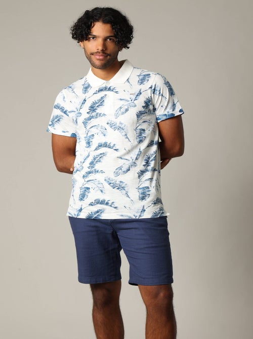 Polo homme DENNIS en coton avec imprimé feuilles 'Deeluxe' - Kiabi Polo homme DENNIS en coton avec imprimé feuilles 'Deeluxe' - Kiabi