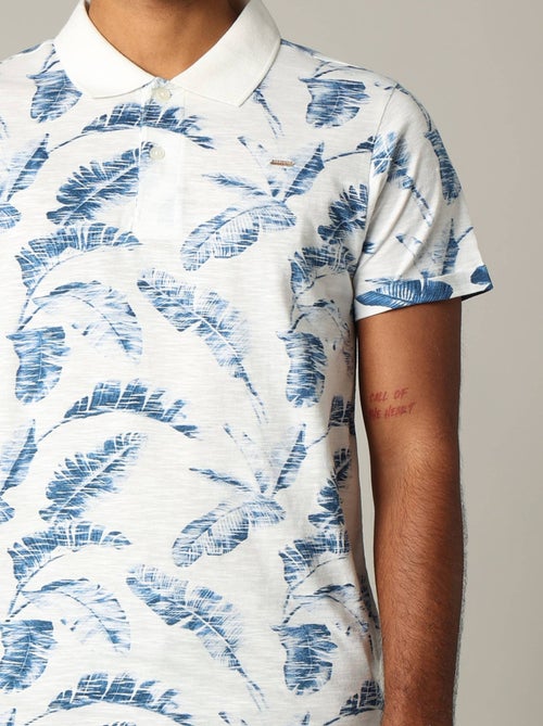 Polo homme DENNIS en coton avec imprimé feuilles 'Deeluxe' - Kiabi Polo homme DENNIS en coton avec imprimé feuilles 'Deeluxe' - Kiabi