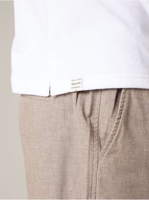 Polo homme en 100% coton éponge 'Deeluxe' - Kiabi