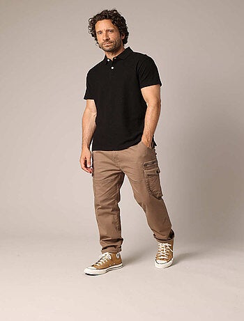 Polo noir pour homme en maille texturée, col classique et coupe élégante. 'Deeluxe'