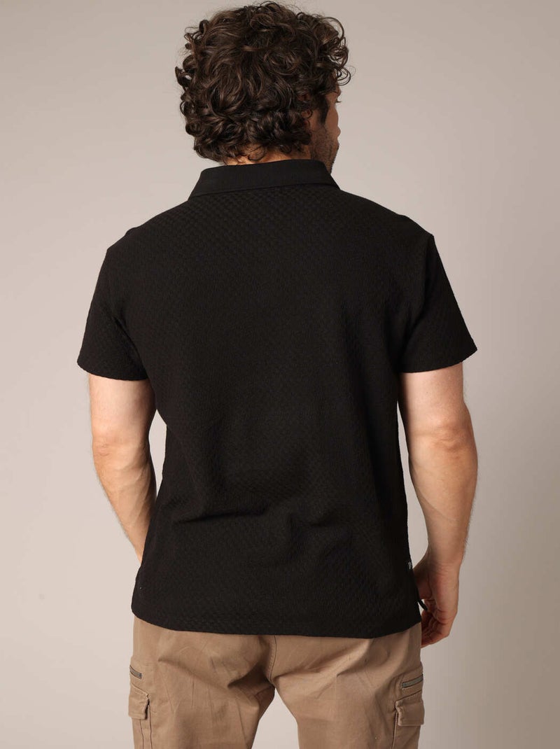 Polo noir pour homme en maille texturée, col classique et coupe élégante. 'Deeluxe' Noir - Kiabi