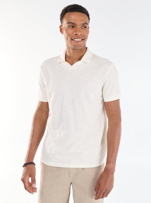 Polo uni à manches courtes pour homme - Kiabi Polo uni à manches courtes pour homme - Kiabi