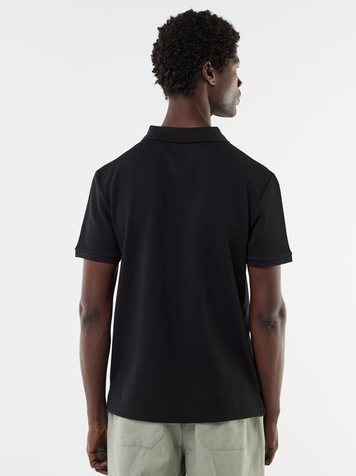Polo uni à manches courtes pour homme - Kiabi Polo uni à manches courtes pour homme - Kiabi