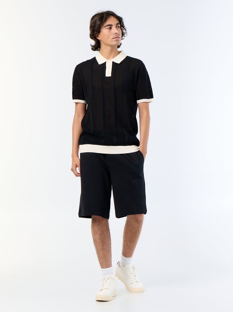 Polo uni en coton pour homme Noir - Kiabi