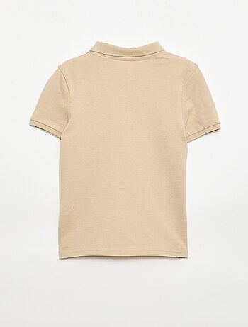 Polo uni en maille piquée