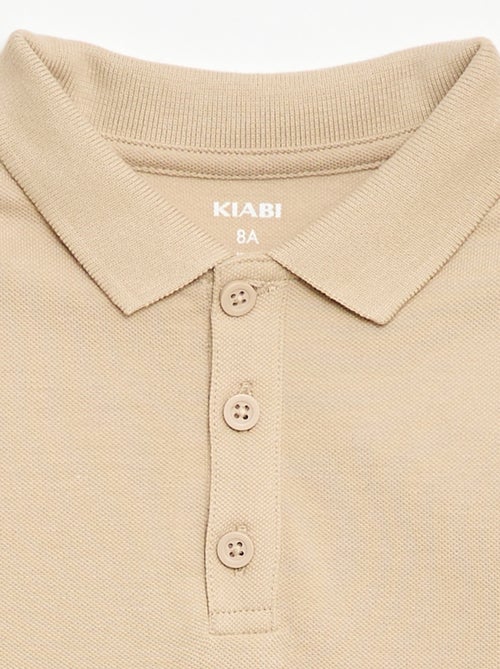 Polo uni en maille piquée - Kiabi Polo uni en maille piquée - Kiabi