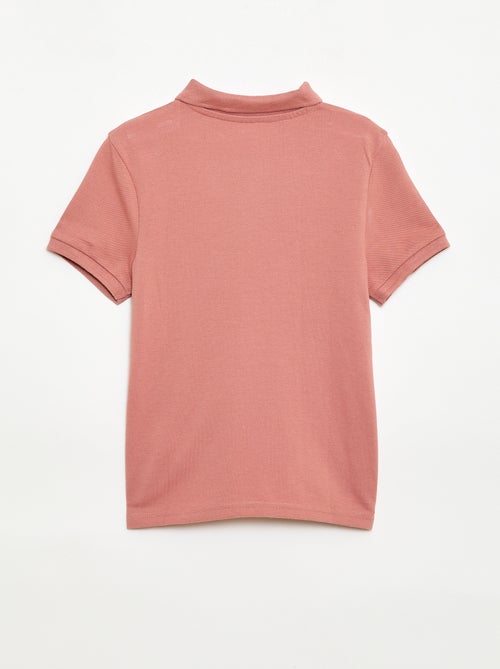 Polo uni en maille piquée - Kiabi Polo uni en maille piquée - Kiabi