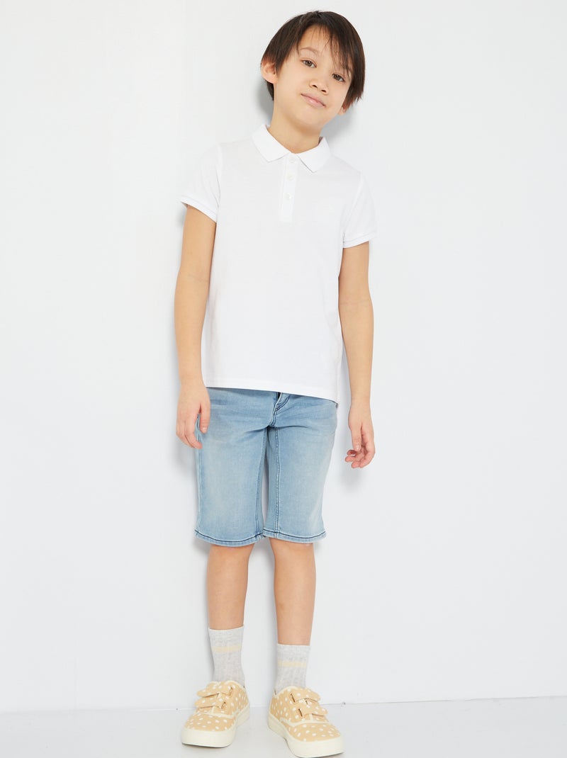 Polo uni en piqué de coton blanc - Kiabi
