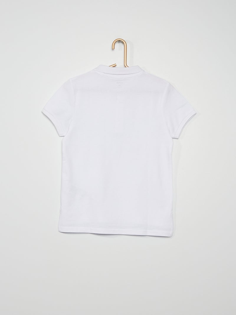 Polo uni en piqué de coton blanc - Kiabi