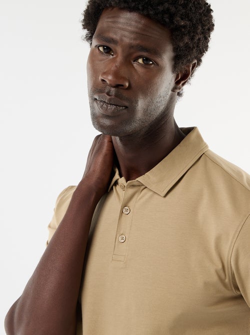Polo uni homme à manches courtes - Kiabi Polo uni homme à manches courtes - Kiabi