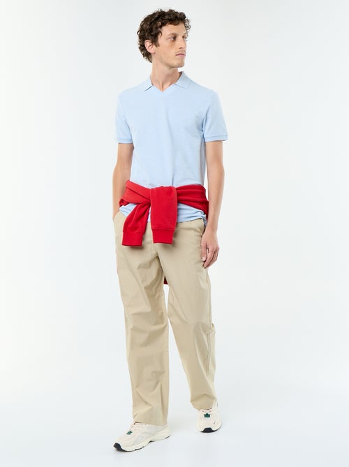 Polo uni pour homme à manches courtes - Kiabi Polo uni pour homme à manches courtes - Kiabi