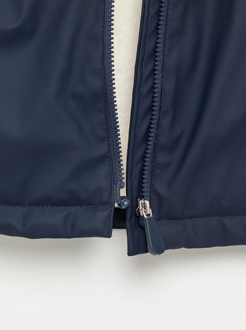 Poncho de pluie - collection facile à enfiler - Kiabi Poncho de pluie - collection facile à enfiler - Kiabi