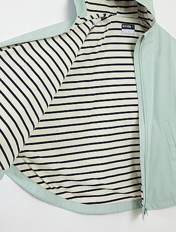 Poncho en matière gomme à capuche - collection facile à enfiler