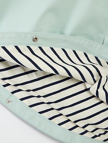 Poncho en matière gomme à capuche - collection facile à enfiler