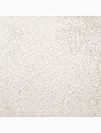 Pouf pliant rond en fausse fourrure avec coffre EZZIO