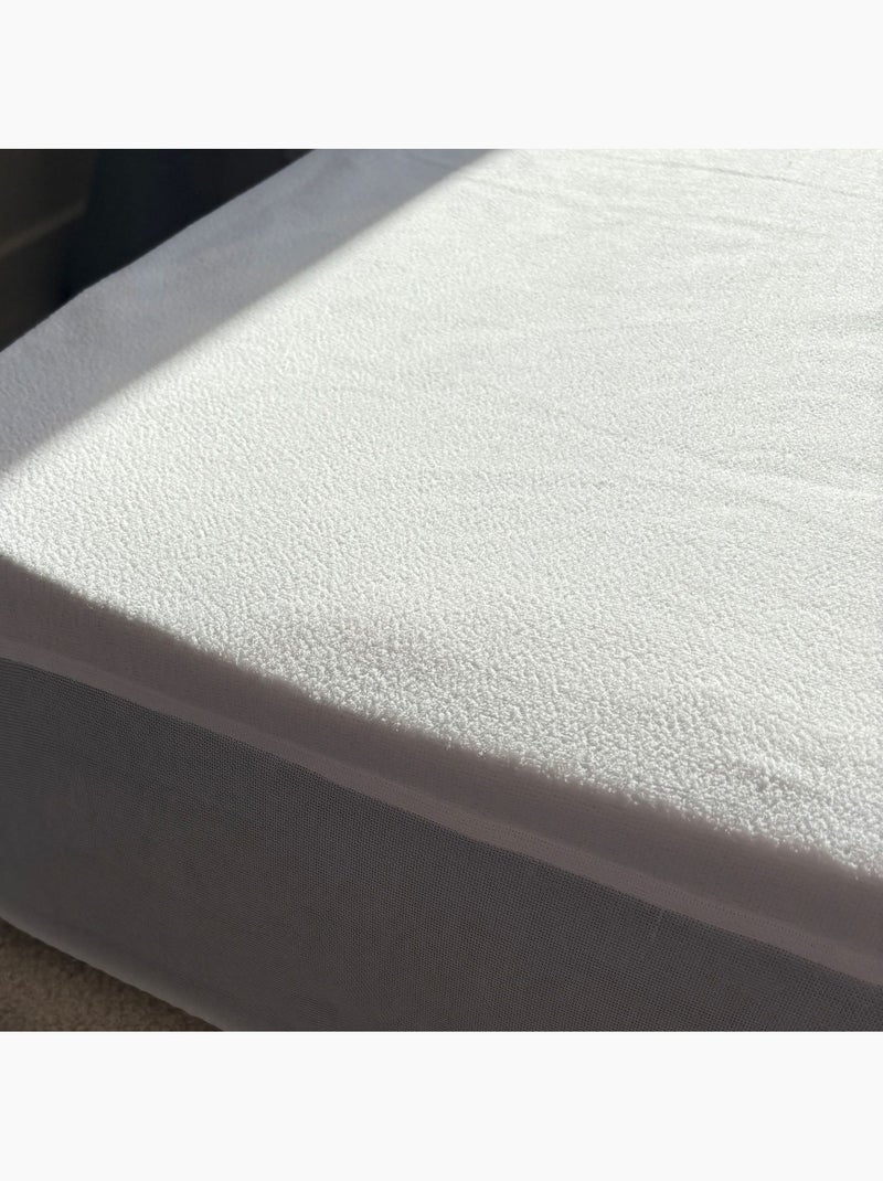 Protège matelas bouclette imperméable bonnet 27 - Terre de Nuit Blanc - Kiabi