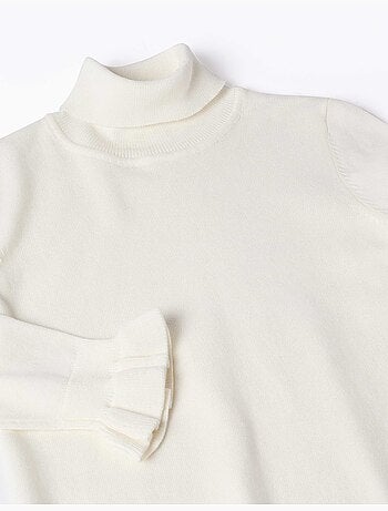 Pull à col montant avec poignets à volants