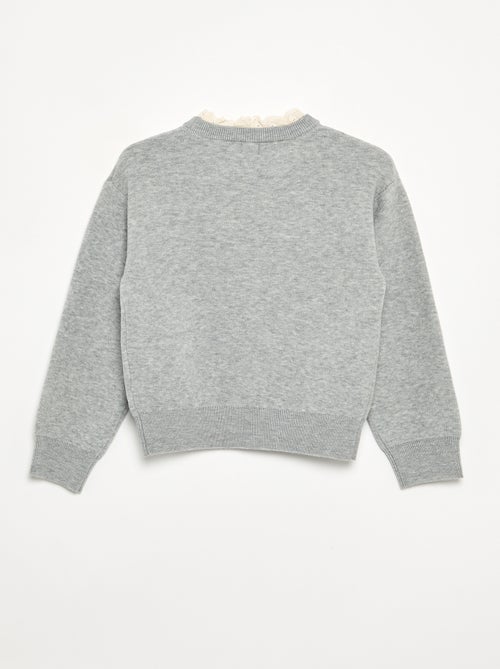 Pull avec col rond effet 2 en 1 en broderies anglaises - Kiabi Pull avec col rond effet 2 en 1 en broderies anglaises - Kiabi