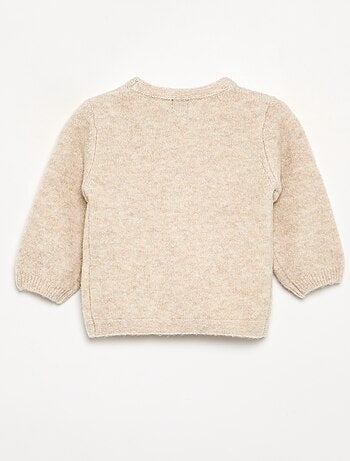 Pull avec grand nœud en dentelle