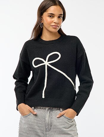 Pull col rond gros nœud cousu