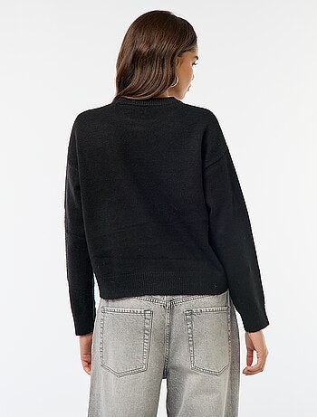 Pull col rond gros nœud cousu