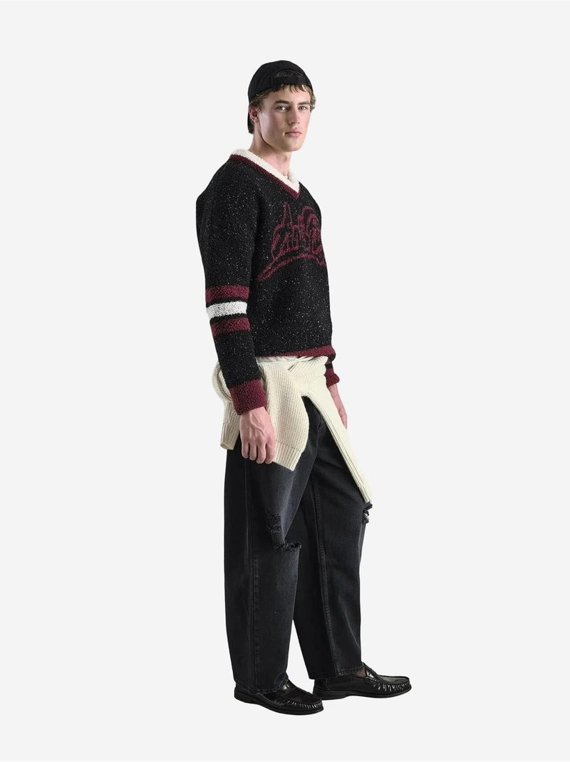 Pull comfort fit en maille épaisse à col en v avec imprimé devise giesto Noir - Kiabi