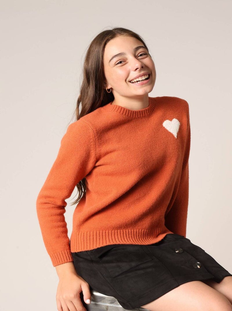 Pull confortable uni avec motif cœur sur la poitrine
 'Deeluxe' Rouge brique - Kiabi