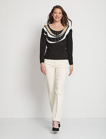 Pull court jacquard strassé col rond