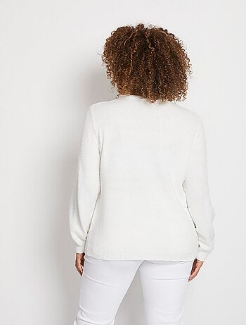 Pull doux uni brodé col rond manches longues