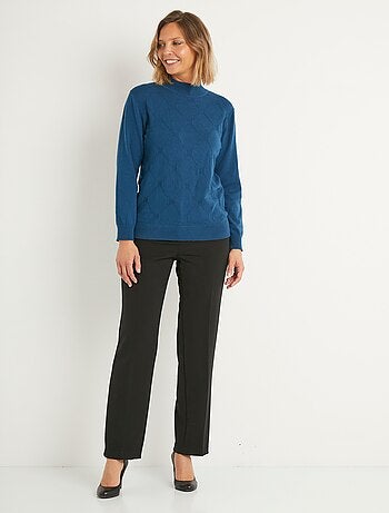 Pull doux uni col montant modal mélangé