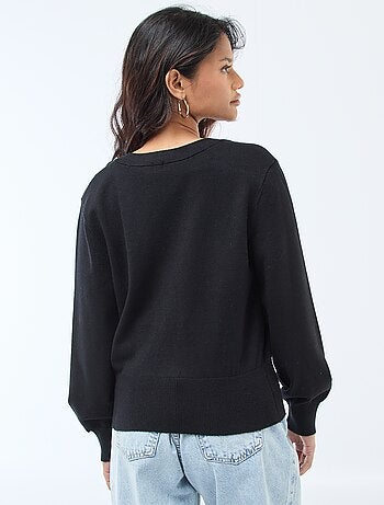 Pull effet gilet cache-coeur avec bouton doré