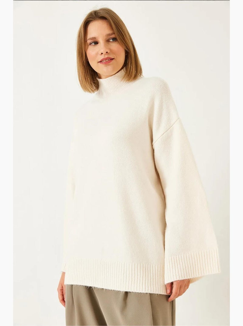Pull en maille à col roulé mi-long oversize avec détails côtelés lucci Crème - Kiabi